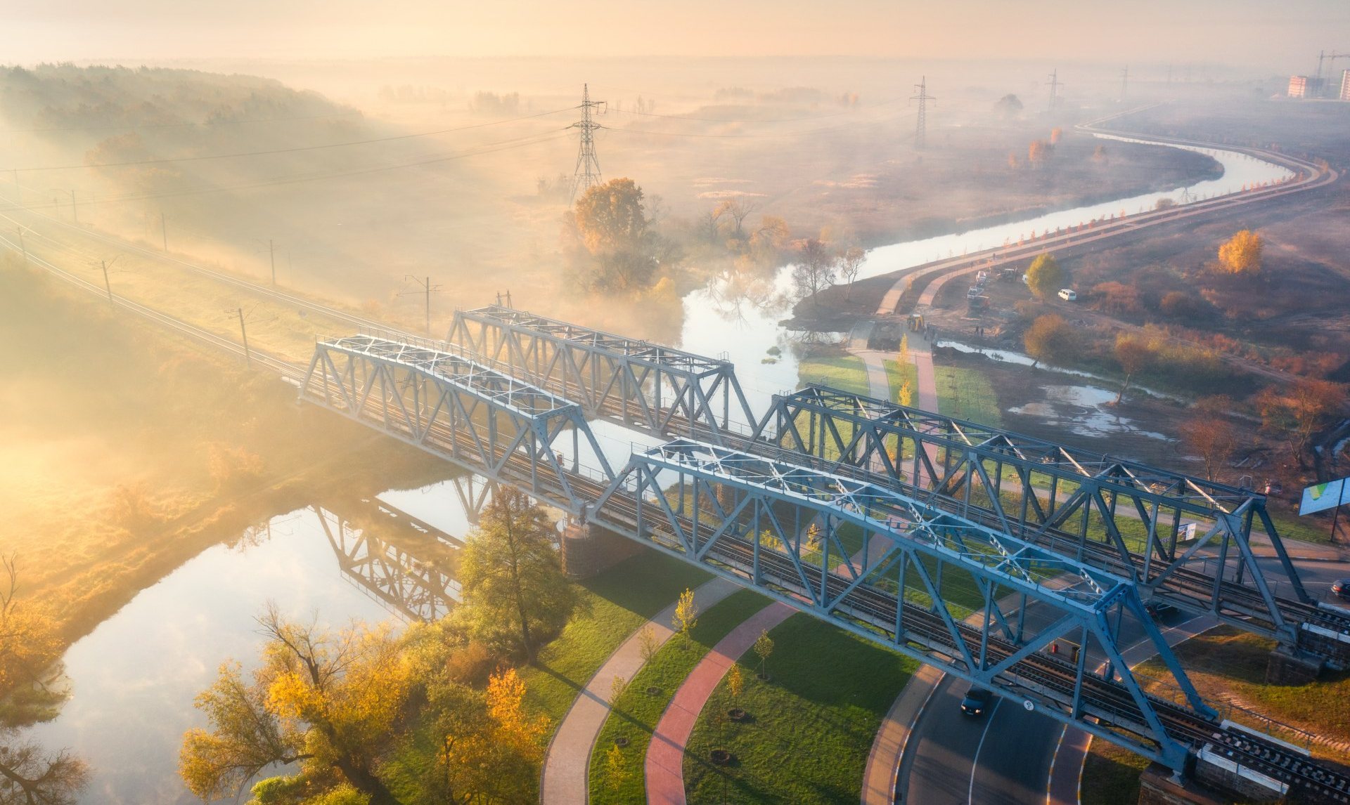 Aerial,View,Of,Beautiful,Railroad,Bridge,And,River,In,Fog